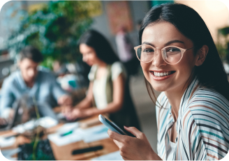 Image of a smiling girl with cell phone
