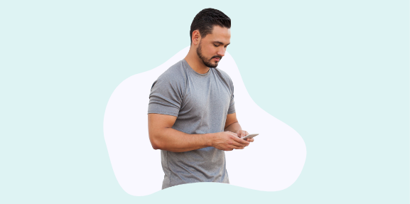 Image of a man texting