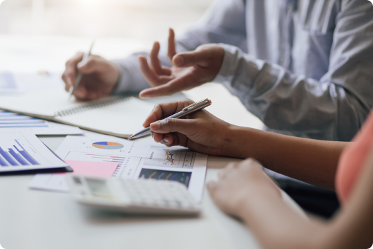 Image of a businessman working on a laptop