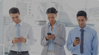 Image of employees texting